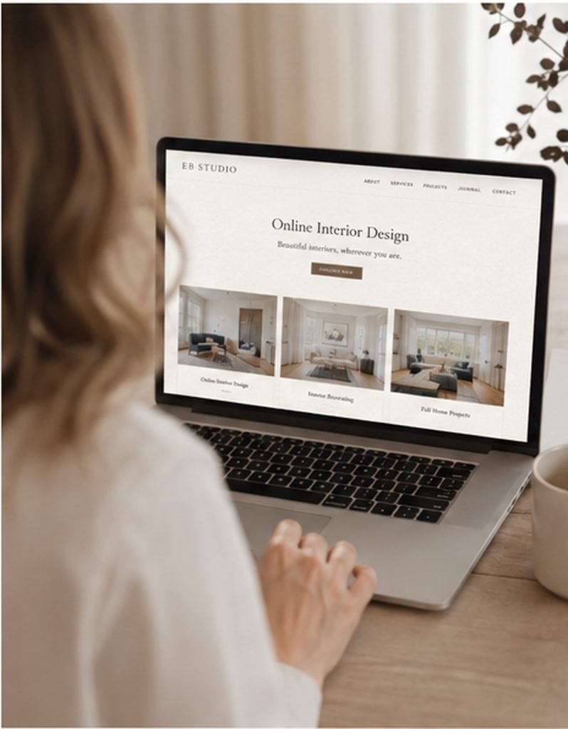 Emma Blomfield, a blonde woman, browses interior design services and room images on her laptop.